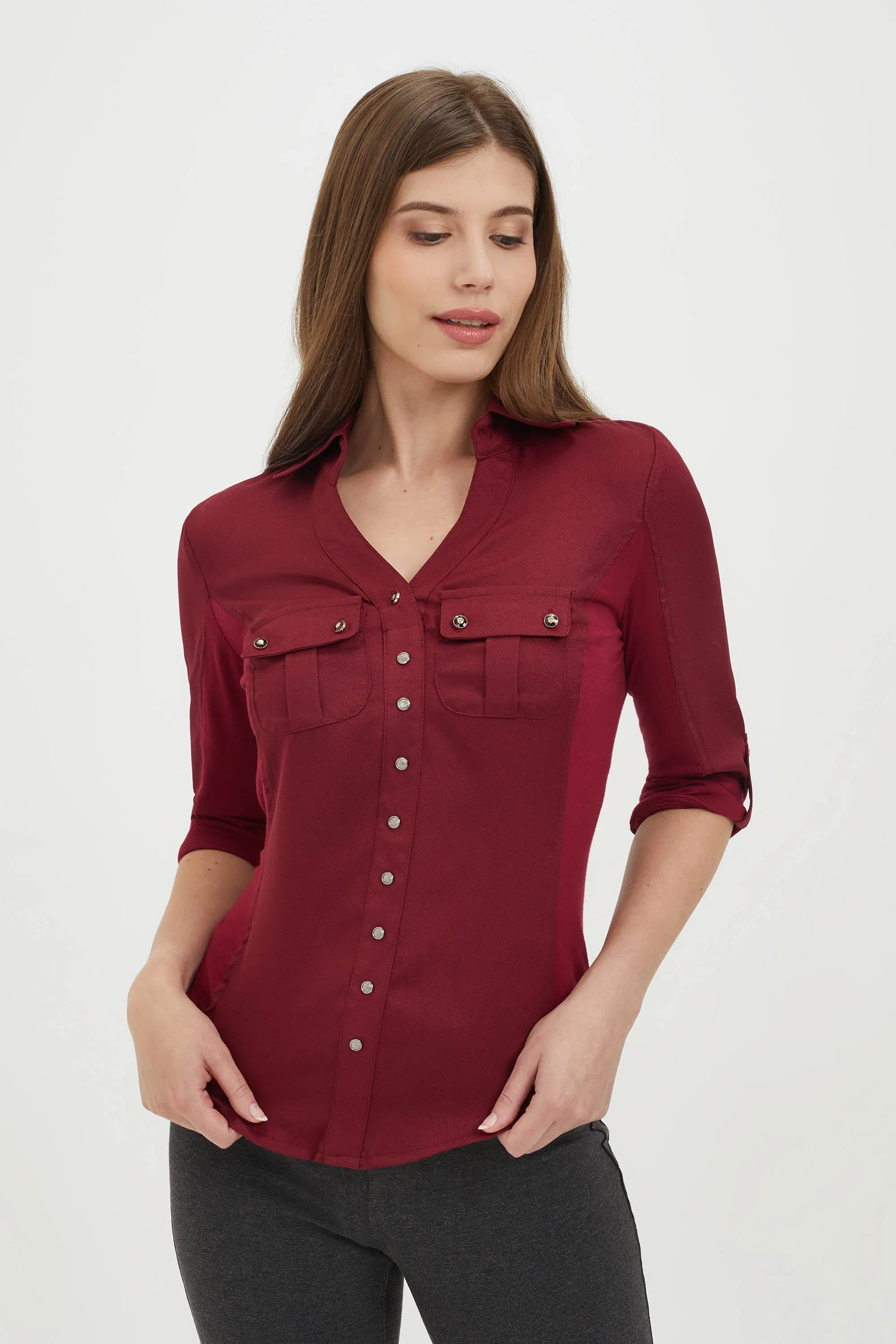 Fitted blouse with pockets